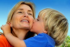 Mother's Day. Young boy and his mother share a joyful moment Mother's Day. Young boy and his mother share a joyful moment