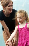 A Mother Smiles at Her Daughter Stock Photography A Mother Smiles at Her Daughter Stock Photography