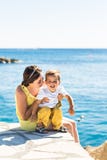 Mother and son playing on the beach royalty free stock photography Mother and son playing on the beach royalty free stock photography