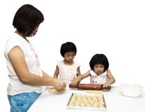 Mother With Kids Learning Making Buiscuits Royalty Free Stock Images Mother With Kids Learning Making Buiscuits Royalty Free Stock Images
