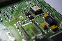 The motherboard of green color from the personal computer. Repair. Texture or background. Electronics. Spare parts. royalty free stock photography The motherboard of green color from the personal computer. Repair. Texture or background. Electronics. Spare parts. royalty free stock photography