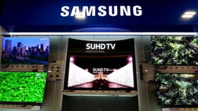 Motion of display Samsung tv on sale. Motion of display 4k Samsung tv on sale inside Best buy store Motion of display Samsung tv on sale. Motion of display 4k Samsung tv on sale inside Best buy store