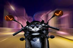 Motorcycle speeding at night Royalty Free Stock Photography Motorcycle speeding at night Royalty Free Stock Photography