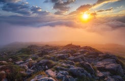 Mountain Mist At Sunrise With Clouds Stock Image