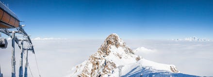 Mountain peak over the clouds in French Alps. stock images Mountain peak over the clouds in French Alps. stock images