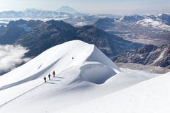 Mountaineers walking climbing snow trail mountains ridge, Bolivia Royalty Free Stock Photo Mountaineers walking climbing snow trail mountains ridge, Bolivia Royalty Free Stock Photo