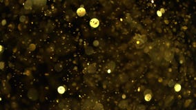 Mouvement lent superbe rôti de grains de café du mouvement lent brisé de glassSuper des particules d'or éclatantes sur le fond no Mouvement lent superbe rôti de grains de café du mouvement lent brisé de glassSuper des particules d'or éclatantes sur le fond no