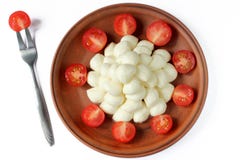 Mozzarella de bébé et tomates-cerises Photographie stock libre de droits Mozzarella de bébé et tomates-cerises Photographie stock libre de droits