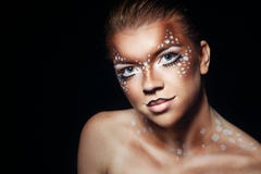 Muchacha con los ciervos del maquillaje imagenes de archivo Muchacha con los ciervos del maquillaje imagenes de archivo