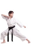 Muchacha que ejercita karate Imagen de archivo libre de regalías Muchacha que ejercita karate Imagen de archivo libre de regalías