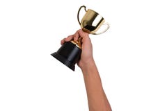 Muchacho asiático que sostiene una taza del trofeo del oro para el primer premio del campeón del lugar aislado en el fondo blanco imagenes de archivo Muchacho asiático que sostiene una taza del trofeo del oro para el primer premio del campeón del lugar aislado en el fondo blanco imagenes de archivo