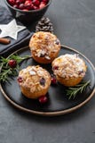 Muffins, cakes with cranberry, rosemary and almond nuts. Christmas decoration. Copy space. royalty free stock photo Muffins, cakes with cranberry, rosemary and almond nuts. Christmas decoration. Copy space. royalty free stock photo