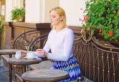 Mug of good tea with milk in morning gives me energy charge. Traditional tea with milk. Woman elegant calm face have royalty free stock photo Mug of good tea with milk in morning gives me energy charge. Traditional tea with milk. Woman elegant calm face have royalty free stock photo