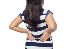 Mujer con dolor de espalda imagen de archivo Mujer con dolor de espalda imagen de archivo