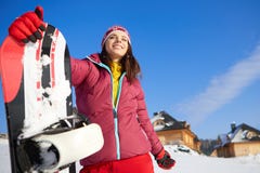 Mujer hermosa con una snowboard Concepto del deporte foto de archivo libre de regalías Mujer hermosa con una snowboard Concepto del deporte foto de archivo libre de regalías