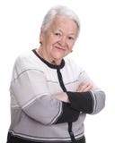 Mujer mayor con las manos cruzadas imagenes de archivo Mujer mayor con las manos cruzadas imagenes de archivo