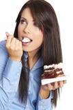Mujer que come la torta fotografía de archivo libre de regalías Mujer que come la torta fotografía de archivo libre de regalías