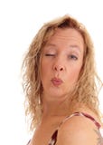 Mujer que sopla un beso Fotografía de archivo libre de regalías Mujer que sopla un beso Fotografía de archivo libre de regalías