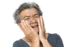 A mulher adulta tem a dor de dente no branco fotografia de stock A mulher adulta tem a dor de dente no branco fotografia de stock