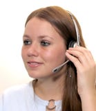 Mulher com uns auriculares Mulher com uns auriculares