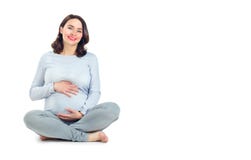 Mulher gravida que toca em sua barriga Conceito saudável da gravidez Meio grávido assento gravid envelhecido da mulher isolado no imagens de stock royalty free Mulher gravida que toca em sua barriga Conceito saudável da gravidez Meio grávido assento gravid envelhecido da mulher isolado no imagens de stock royalty free