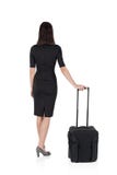 Mulher isolada com mala de viagem fotografia de stock Mulher isolada com mala de viagem fotografia de stock
