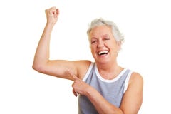 Mulher sênior que mostra seus músculos fotos de stock royalty free Mulher sênior que mostra seus músculos fotos de stock royalty free