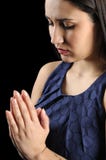 Mulheres novas e bonitas que praying imagens de stock royalty free Mulheres novas e bonitas que praying imagens de stock royalty free