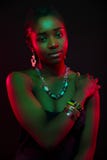 Multi color portrait of confident african woman wearing jewelry stock photography Multi color portrait of confident african woman wearing jewelry stock photography