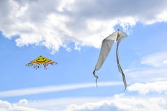 Multi colored kites in the blue sky royalty free stock photo Multi colored kites in the blue sky royalty free stock photo