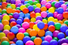 Multi-colored plastic balls for dry pool kid entertainment close-up royalty free stock image Multi-colored plastic balls for dry pool kid entertainment close-up royalty free stock image