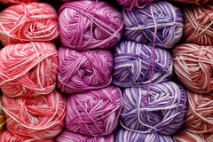 Multi-colored textile threads in hand-made reels are displayed for sale in the store royalty free stock photography Multi-colored textile threads in hand-made reels are displayed for sale in the store royalty free stock photography