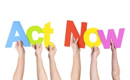 Multi-Ethnic Hands Holding The Words Act Now royalty free stock photo Multi-Ethnic Hands Holding The Words Act Now royalty free stock photo