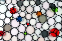 Multicolored Round Glass Photographic Filters Of Various Sizes Stock Photo