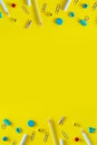 Multicolored school supplies on yellow background with copy space. Vertical flat lay for social media stories royalty free stock photography Multicolored school supplies on yellow background with copy space. Vertical flat lay for social media stories royalty free stock photography