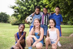 Multiethnic group of children with soccer ball