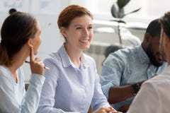 Multiracial business people sitting at office desk royalty free stock photos Multiracial business people sitting at office desk royalty free stock photos