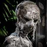 Mummified corpse wrapped in a bandage worn down. royalty free stock images Mummified corpse wrapped in a bandage worn down. royalty free stock images