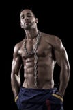 Muscled Man On A Black Background Stock Photography