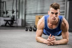 Muscular man planking stock image Muscular man planking stock image