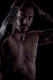 Muscular young man with many tattoos, dragan style