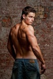 Muscular young naked sexy man in jeans Royalty Free Stock Photos Muscular young naked sexy man in jeans Royalty Free Stock Photos