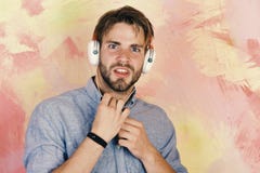 Musical lifestyle. American handsome bearded guy with headphones. stock image Musical lifestyle. American handsome bearded guy with headphones. stock image