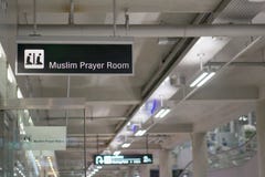 Muslim prayer room information board sign at international airport terminal Stock Image Muslim prayer room information board sign at international airport terminal Stock Image