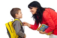 Mutter, die Sohn für Schule vorbereitet stockbild Mutter, die Sohn für Schule vorbereitet stockbild