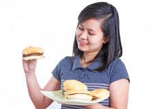 http://thumbs.dreamstime.com/t/my-delicious-hamburger-young-smiling-asian-lady-holding-plate-isolated-white-background-36090760.jpg