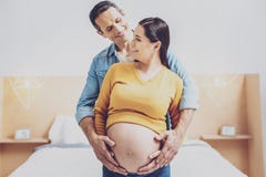Charming pregnancy waiting for her baby stock image Charming pregnancy waiting for her baby stock image