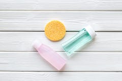Mycelial water , lotion and sponge for skin care on white wooden background flat lay space for text stock photos Mycelial water , lotion and sponge for skin care on white wooden background flat lay space for text stock photos