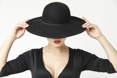 Mysterious girl in a hat royalty free stock image Mysterious girl in a hat royalty free stock image
