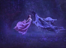 The mysterious witch is dancing with a demon, dark forces, in the air. Kiss dementor. Taking away the soul. A dress royalty free stock photo The mysterious witch is dancing with a demon, dark forces, in the air. Kiss dementor. Taking away the soul. A dress royalty free stock photo